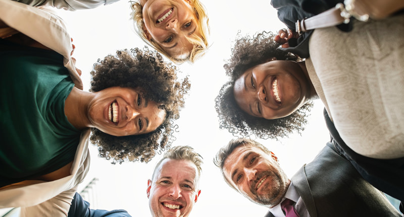 Diverse professionals in a circle